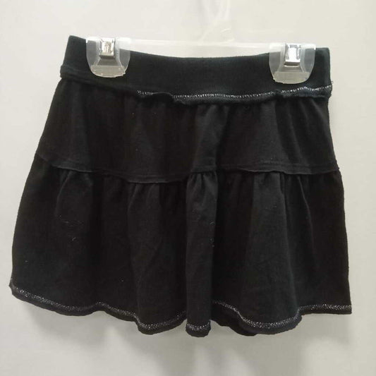 skirt: gold trim w/ruffle layers