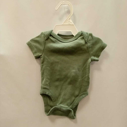 onesie: solid green